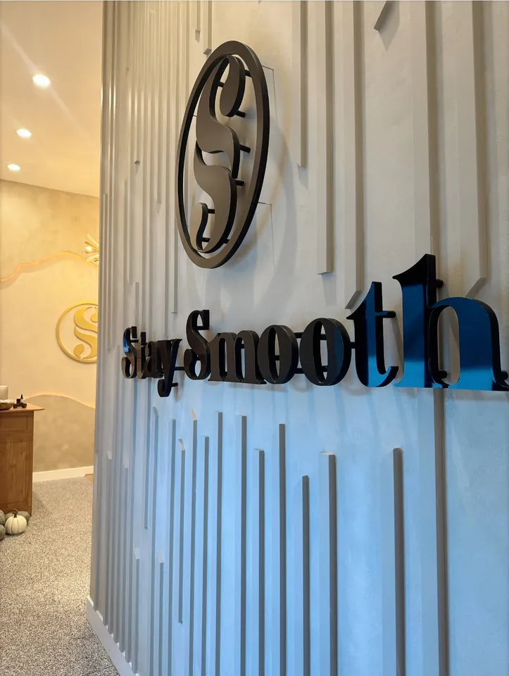 The Stay Smooth sign on the studio wall