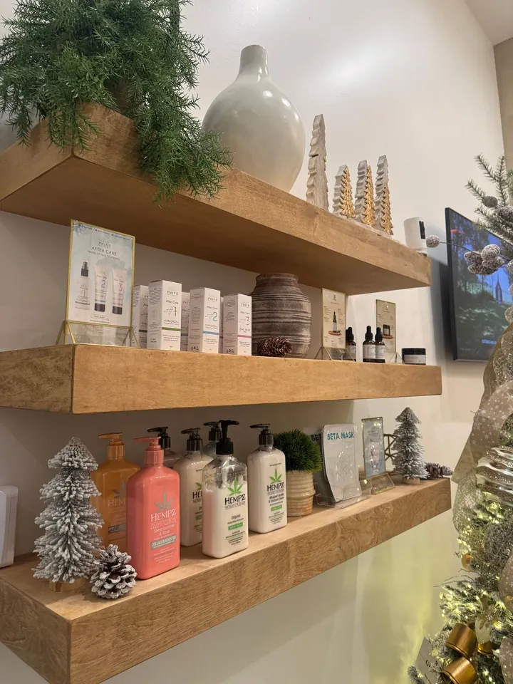 Wooden shelves with curated skincare products